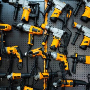 many electric drills on the shelf