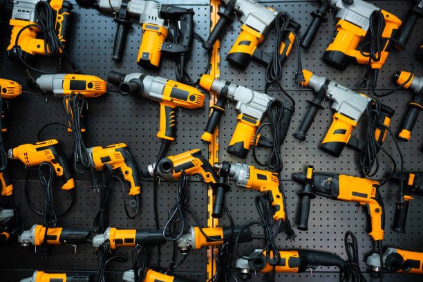 many electric drills on the shelf